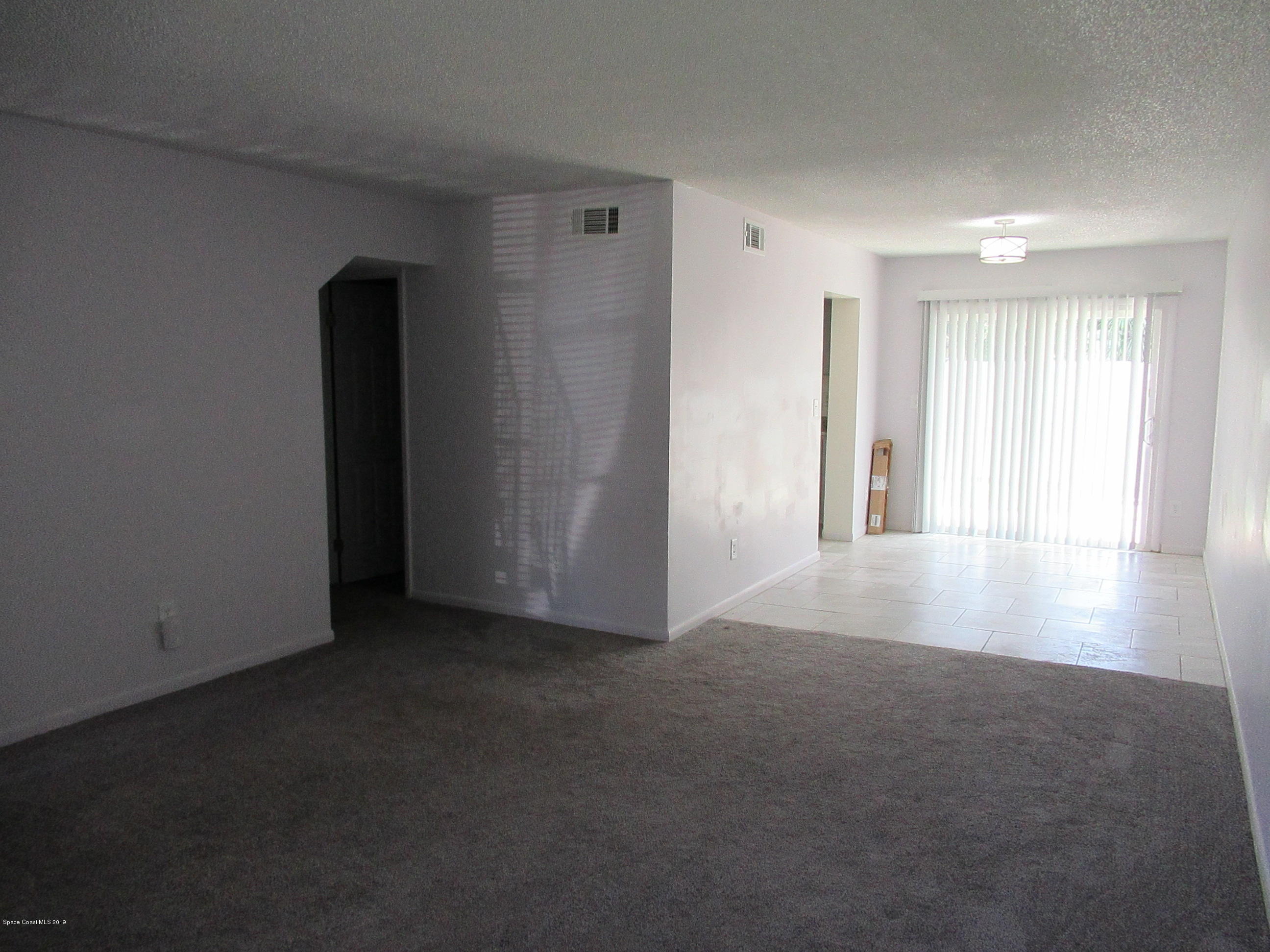 4015 Tree Ridge Lane Northeast Palm Bay, FL 32905 - Photo 6 of 15 Living Room