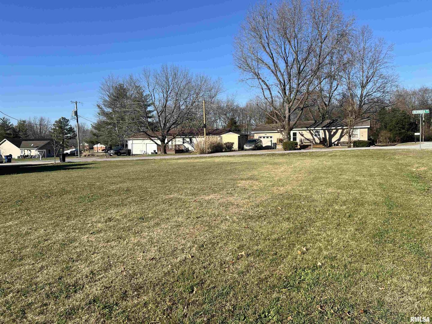 0 St Vincent Lane Marion, IL 62959 - Photo 3 of 8 a view of a field with trees and a houses