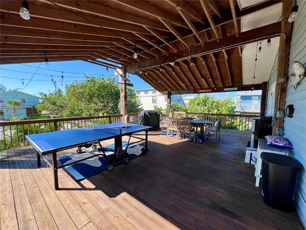 a view of kitchen with furniture and wooden floor