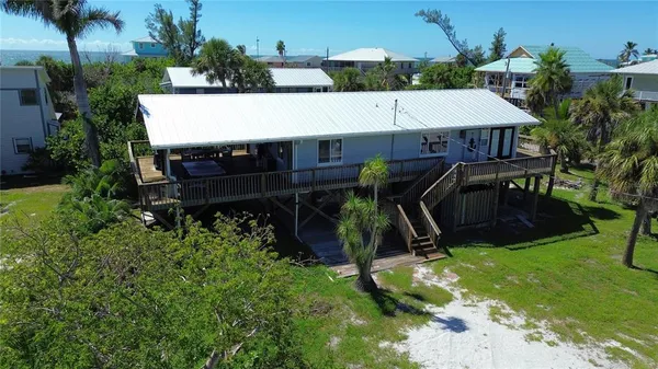 a house with trees in front of it