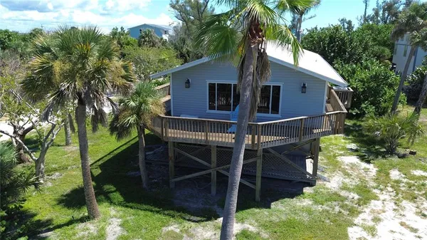 a view of a house with a deck