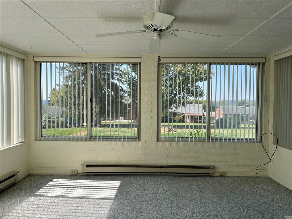 233 Reed Street Lower Burrell, PA 15068 - Photo 15 of 40 Lovely sun room with heat.