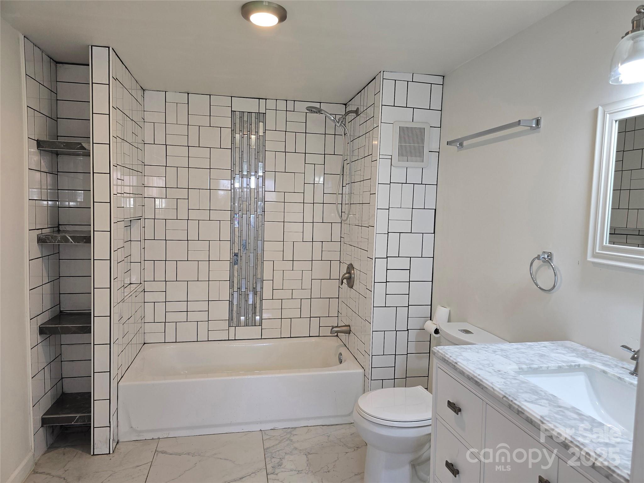 169 East Lacy Street Chester, SC 29706 - Photo 15 of 17 a bathroom with a sink a toilet and shower