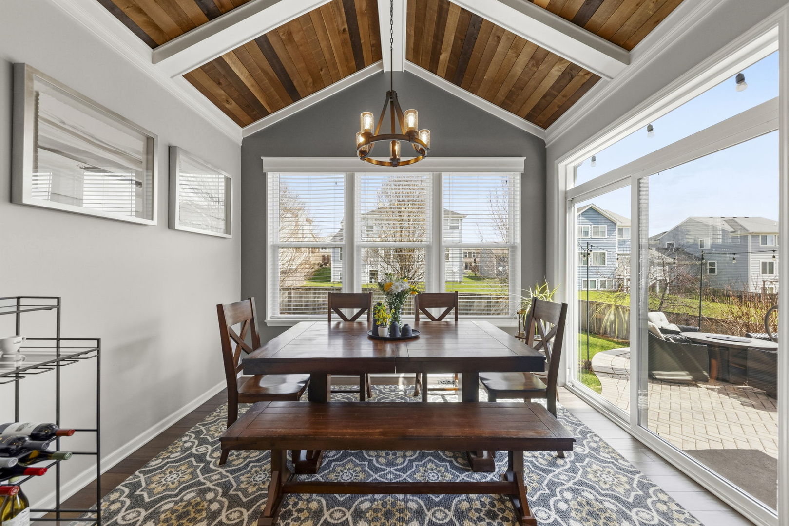 3306 Rumsford Boulevard Elgin, IL 60124 - Photo 11 of 29 a view of a dining room with furniture large windows and wooden floor