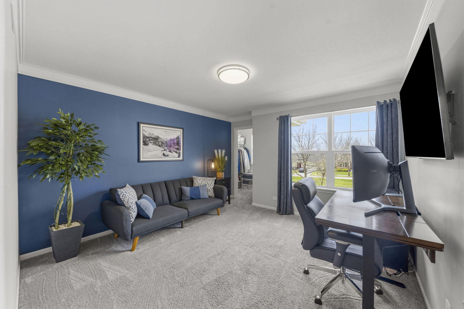 3306 Rumsford Boulevard Elgin, IL 60124 - Photo 21 of 29 a living room with furniture and a flat screen tv