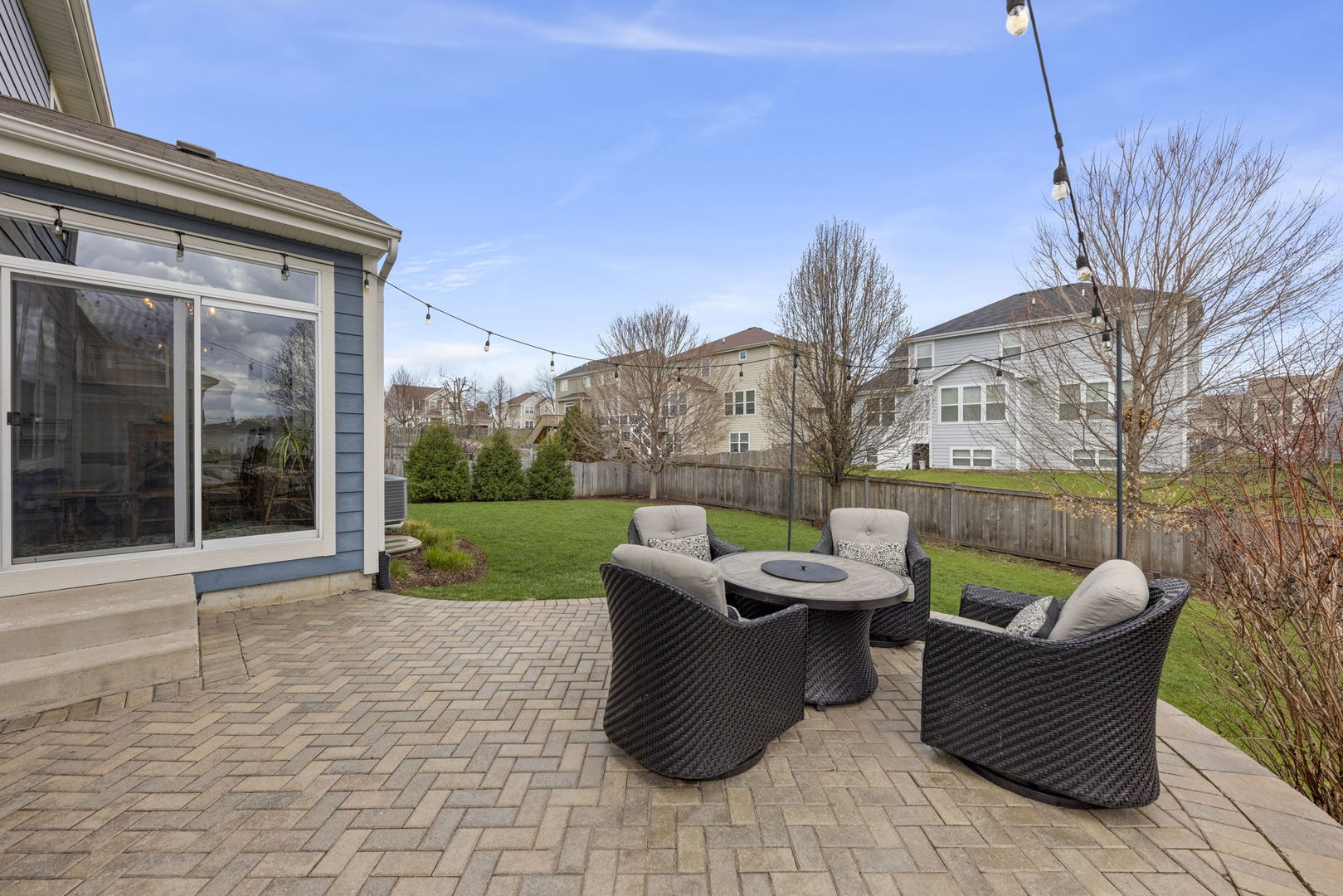 3306 Rumsford Boulevard Elgin, IL 60124 - Photo 26 of 29 a view of a patio with couches chairs and a fire pit