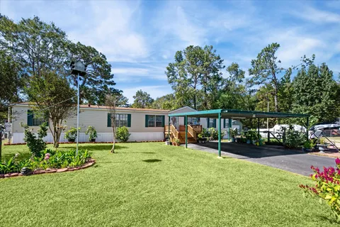 $240,000 | 23652 West Heritage Oaks Drive, Porter, TX 77365