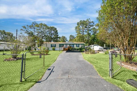 $240,000 | 23652 West Heritage Oaks Drive, Porter, TX 77365
