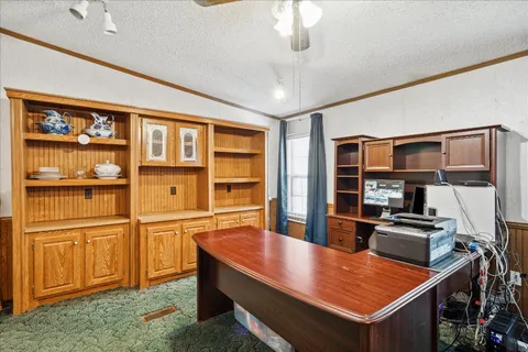 a kitchen with stainless steel appliances granite countertop a stove and a refrigerator