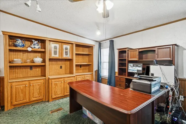 a kitchen with stainless steel appliances granite countertop a stove and a refrigerator