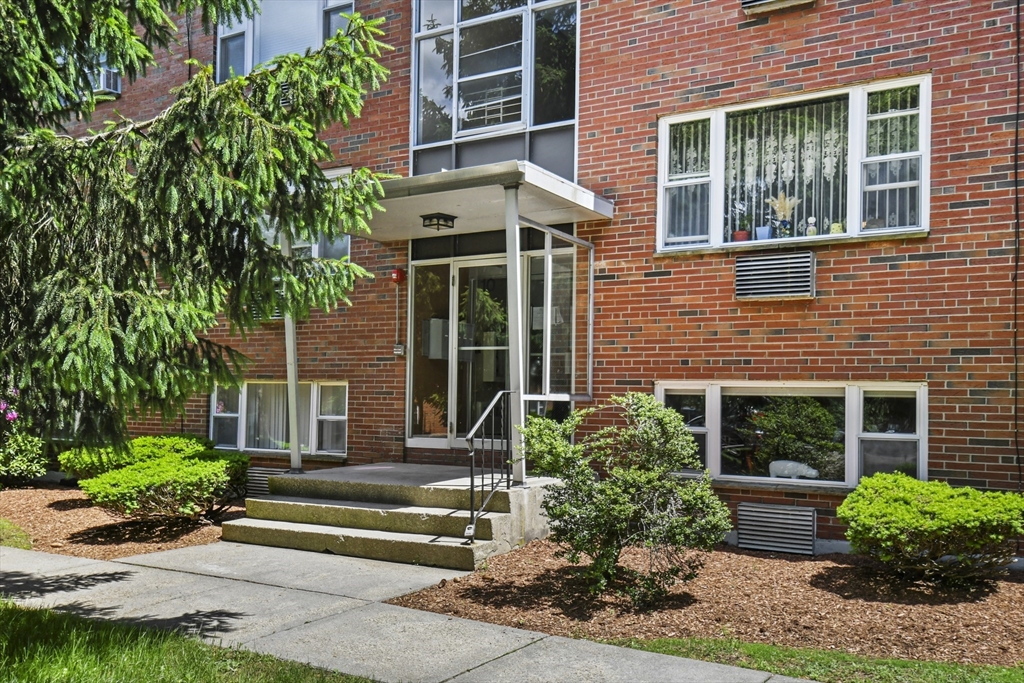 a front view of a house having yard