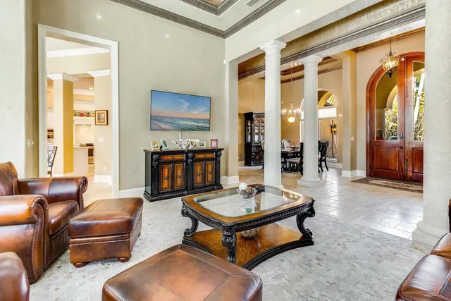 a dining room with furniture and window
