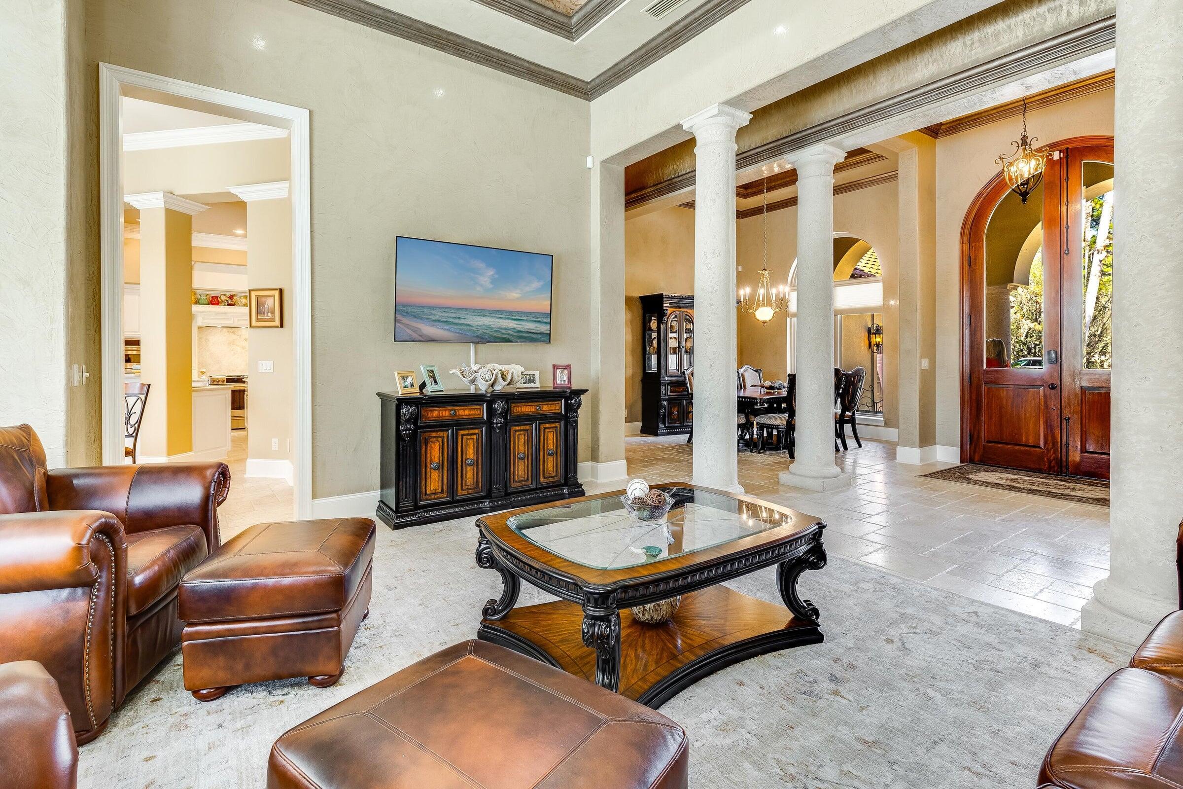 428 Captains Circle Destin, FL 32541 - Photo 15 of 68 a living room with furniture and a fireplace
