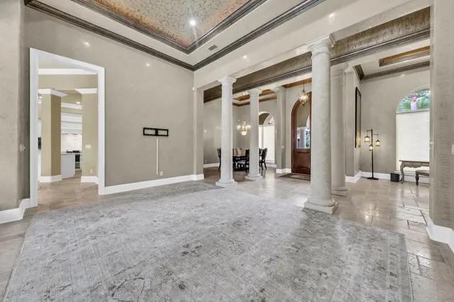 a kitchen with granite countertop a sink stainless steel appliances and cabinets