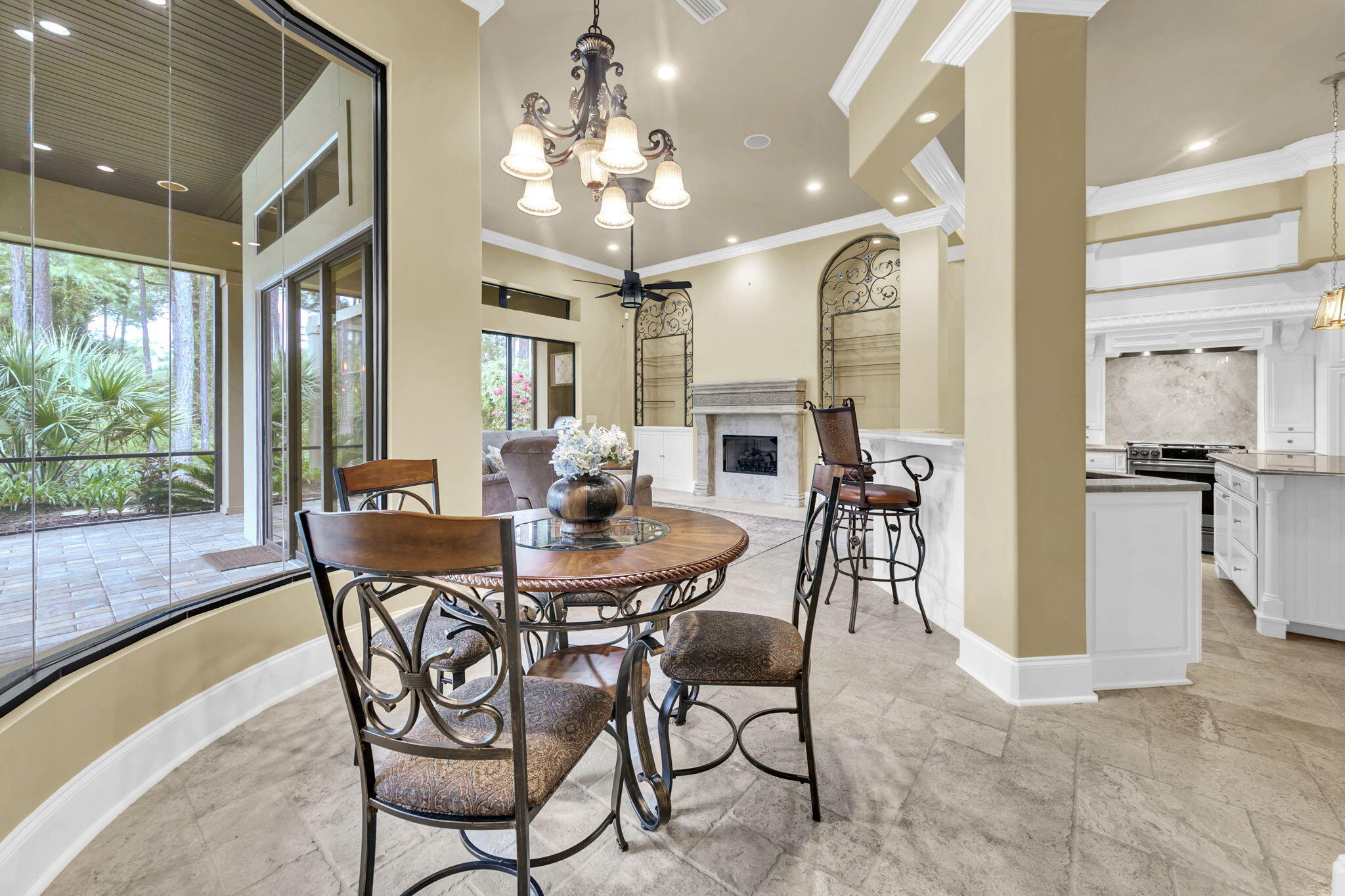 428 Captains Circle Destin, FL 32541 - Photo 18 of 68 a view of a dining room with furniture wooden floor and chandelier