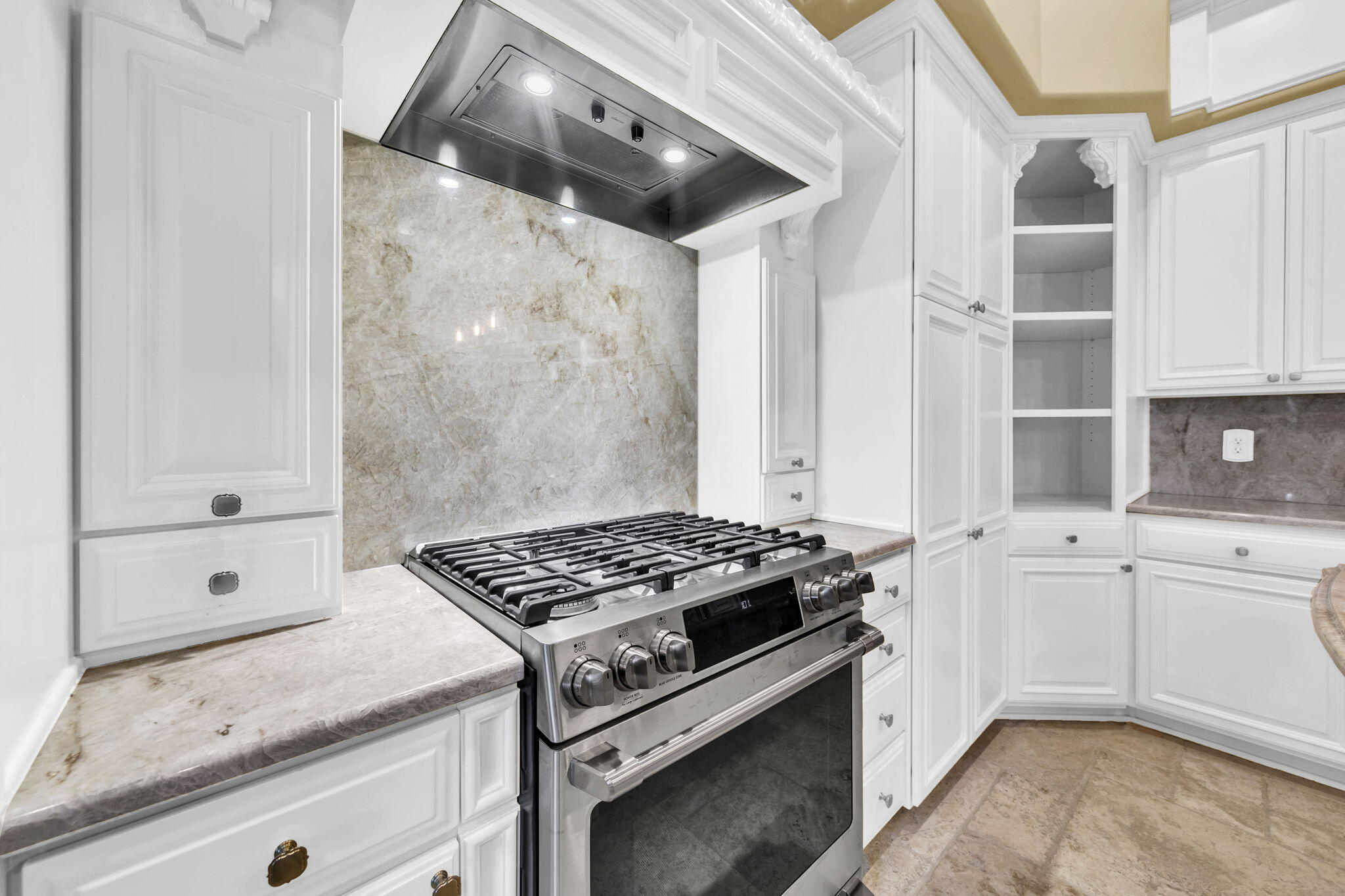 428 Captains Circle Destin, FL 32541 - Photo 23 of 68 a kitchen with granite countertop a stove and a sink