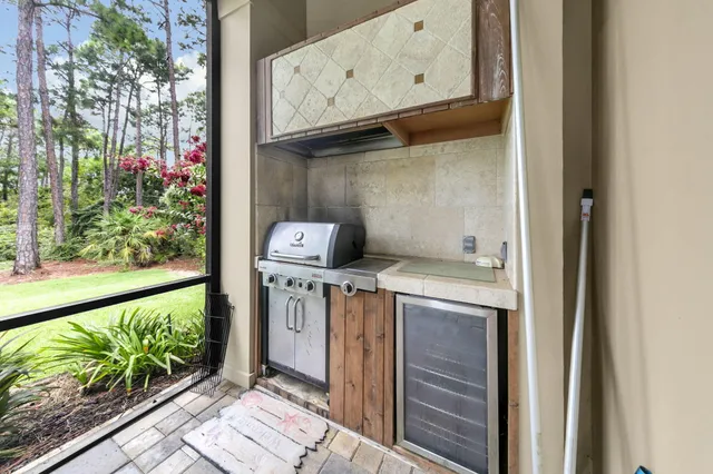 a bathroom with a tub and shower