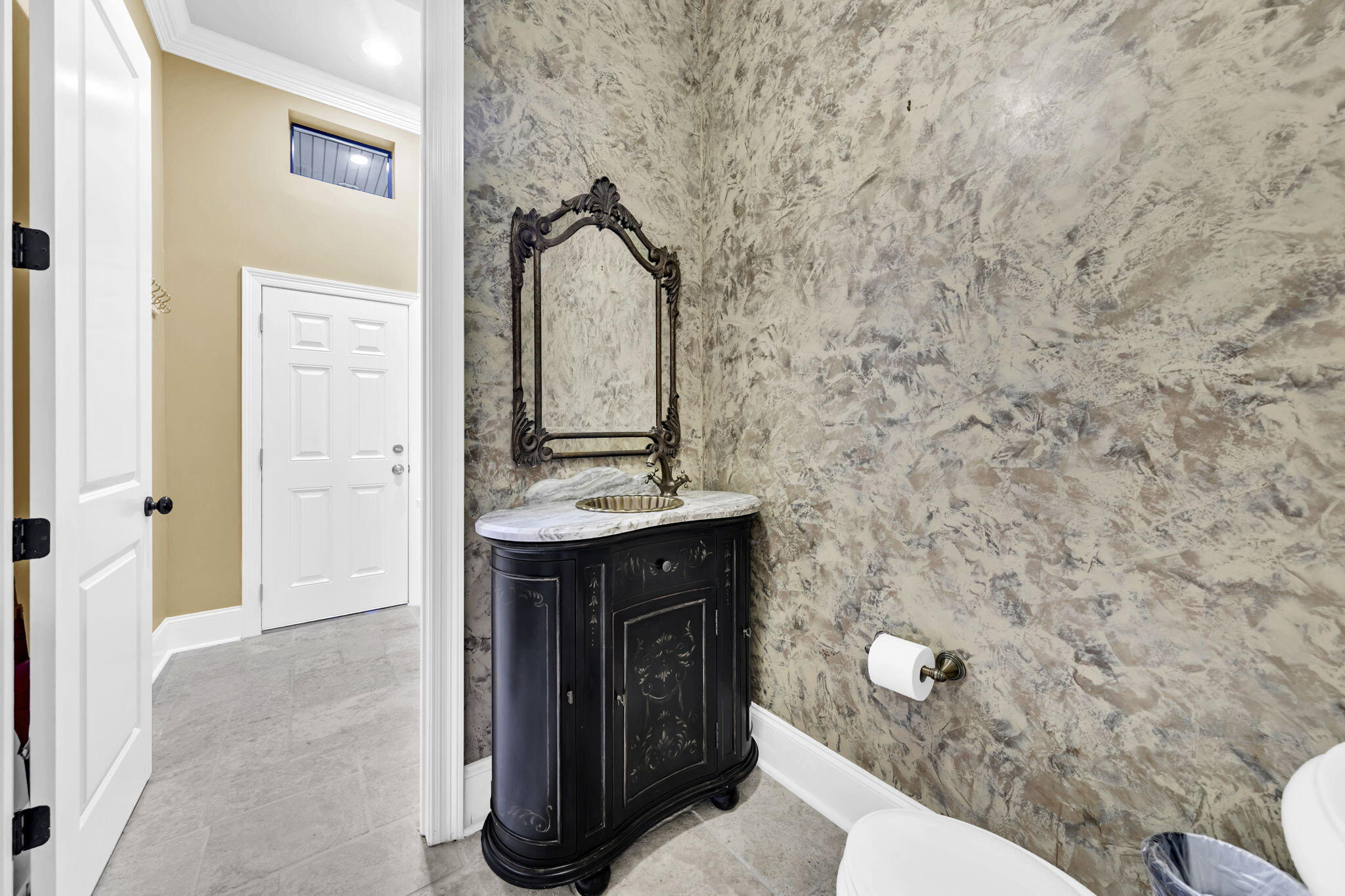 428 Captains Circle Destin, FL 32541 - Photo 37 of 68 a bathroom with a sink and mirror with toilet