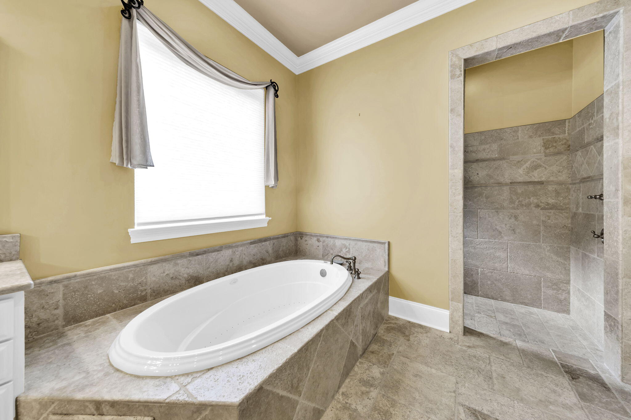 428 Captains Circle Destin, FL 32541 - Photo 45 of 68 a bathroom with a tub and shower