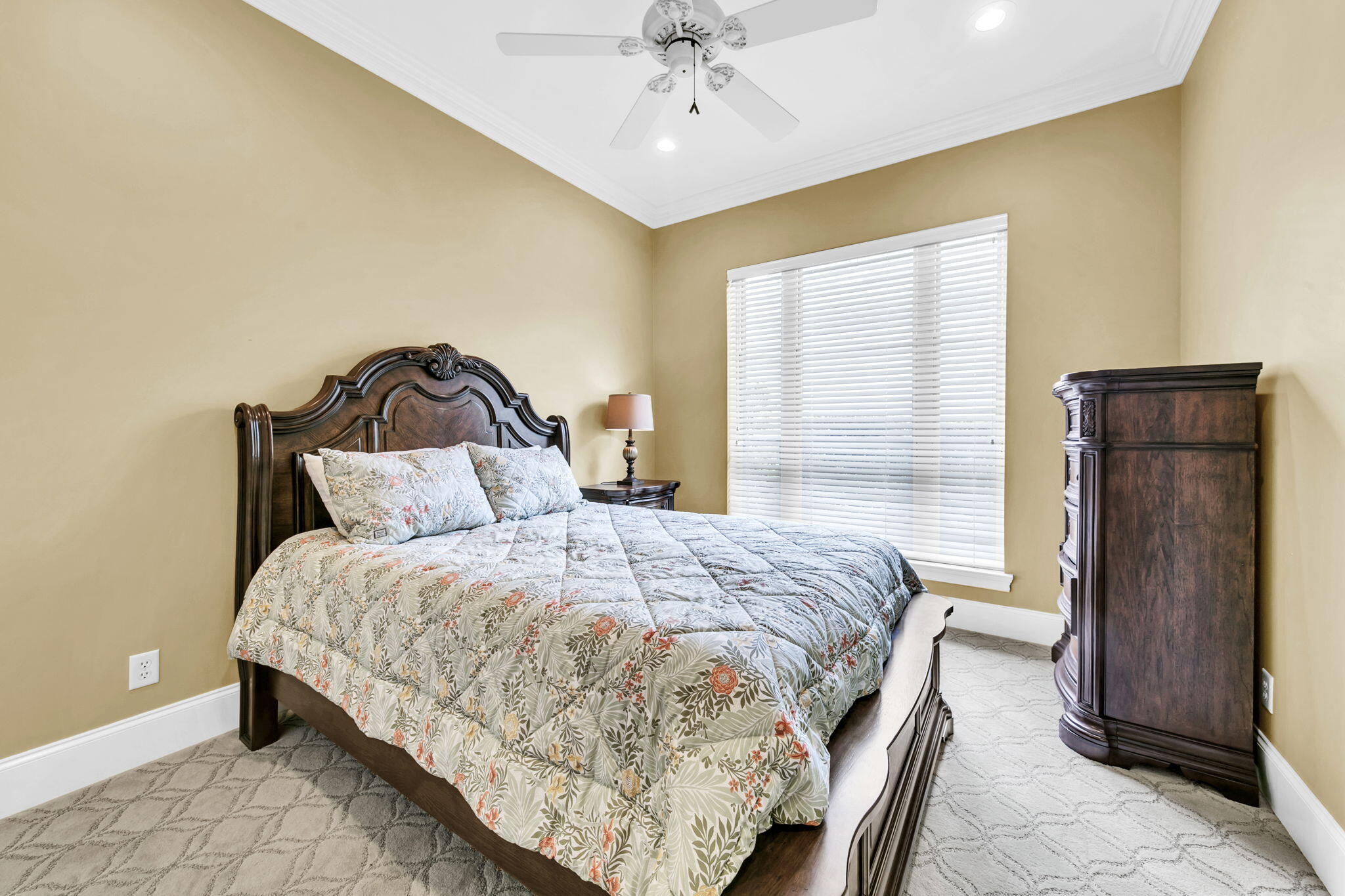 428 Captains Circle Destin, FL 32541 - Photo 48 of 68 a bedroom with a bed and a chandelier