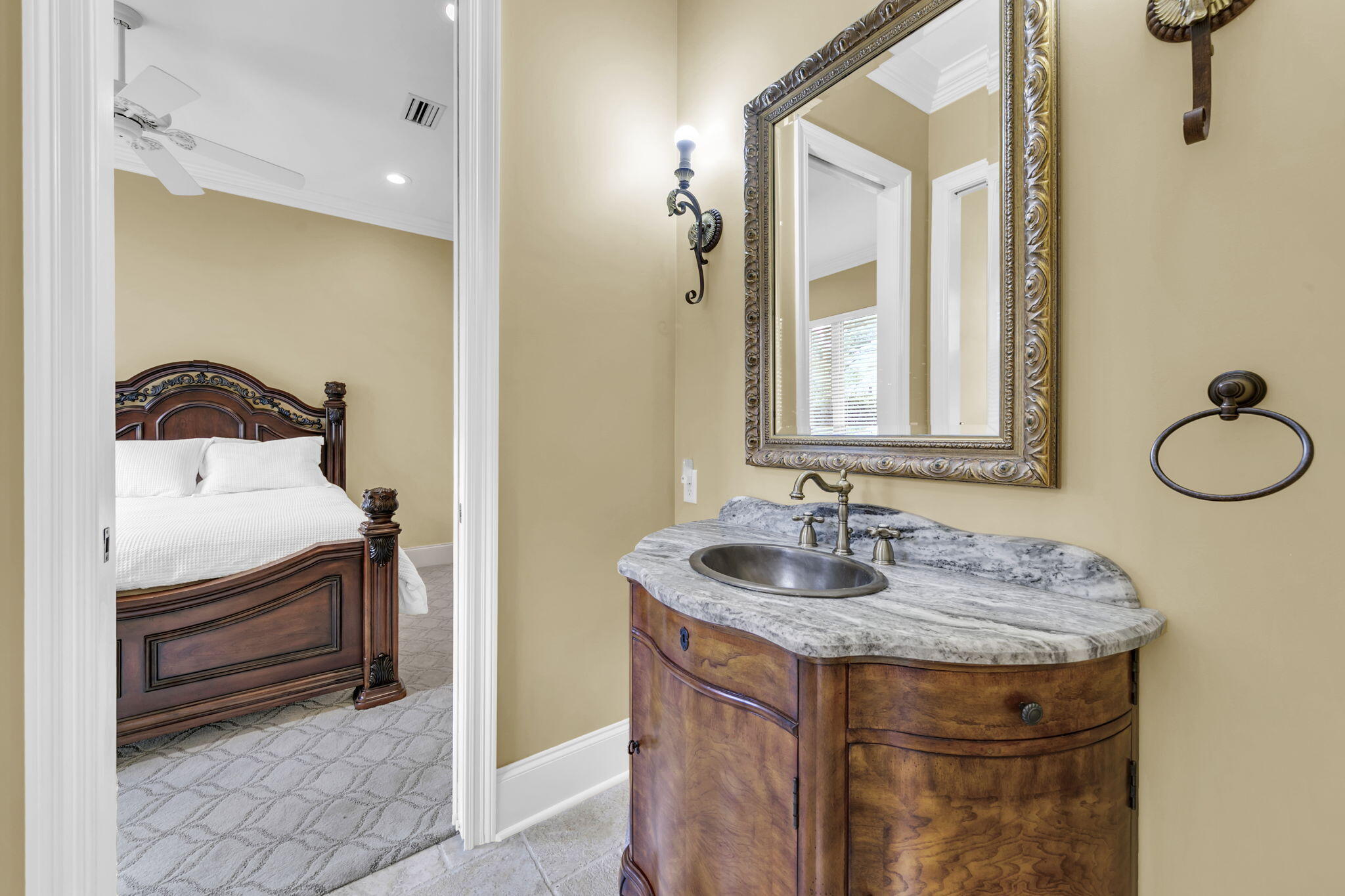 428 Captains Circle Destin, FL 32541 - Photo 50 of 68 a bathroom with a sink and a mirror