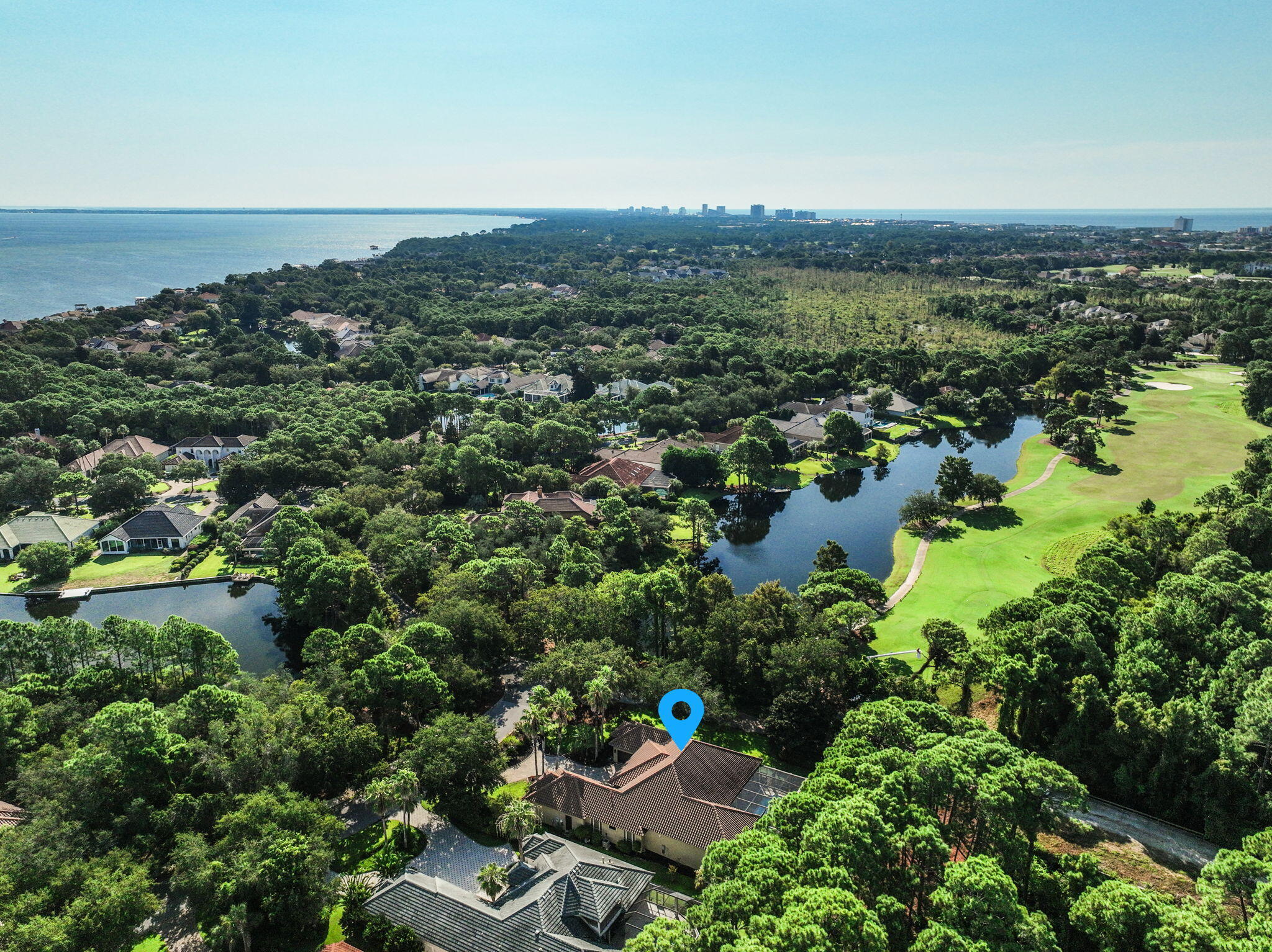 428 Captains Circle Destin, FL 32541 - Photo 60 of 68 an aerial view of a houses with a yard and lake view