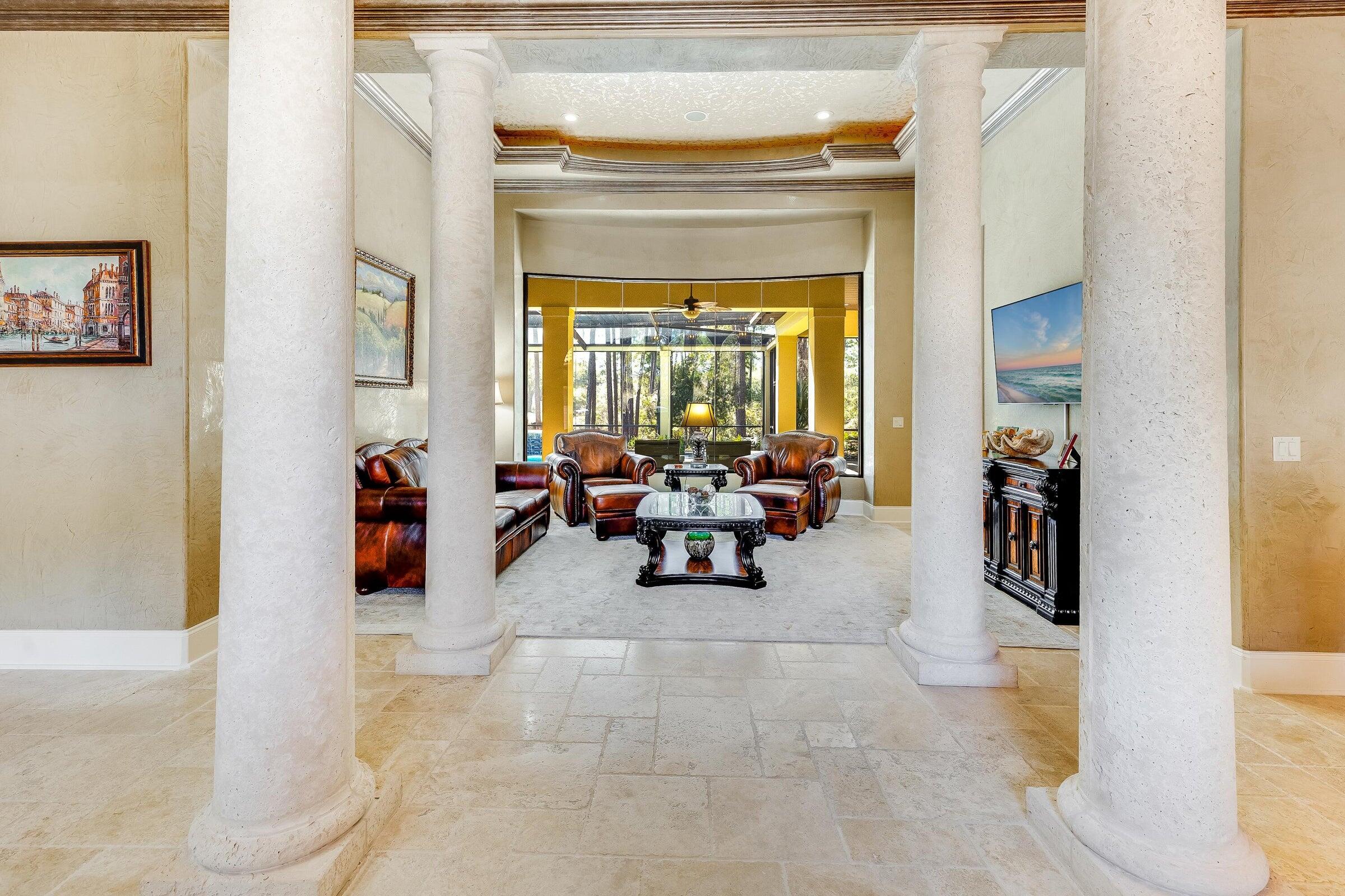 428 Captains Circle Destin, FL 32541 - Photo 10 of 68 a living room with furniture and a large window