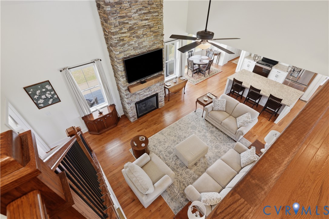 25181 West Soap Stone Road Jetersville, VA 23083 - Photo 27 of 54 Open-concept living area featuring a vaulted ceili