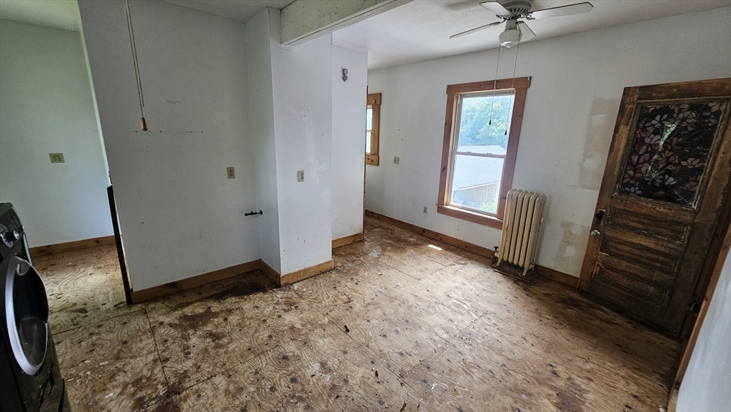 179 Oak Street Springfield, MA 01151 - Photo 17 of 28 an empty room with a door
