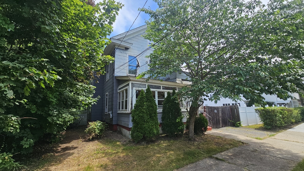 179 Oak Street Springfield, MA 01151 - Photo 2 of 28 a view of a back yard