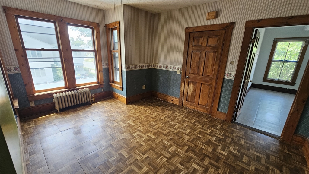 179 Oak Street Springfield, MA 01151 - Photo 21 of 28 an empty room with windows