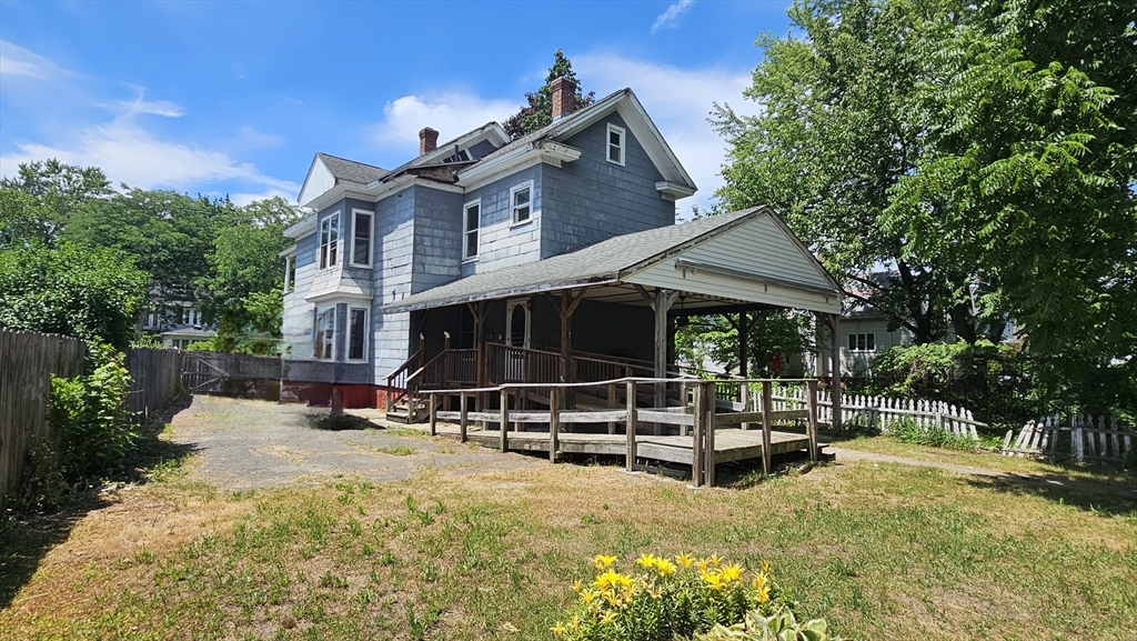 179 Oak Street Springfield, MA 01151 - Photo 28 of 28 a view of a house with backyard and sitting area