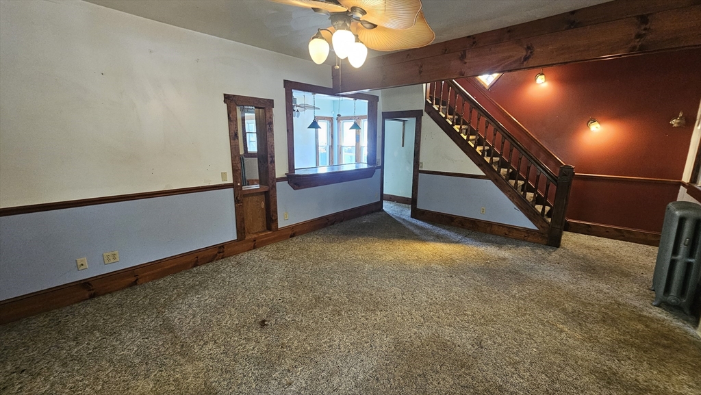 179 Oak Street Springfield, MA 01151 - Photo 5 of 28 a view of an empty room with a window