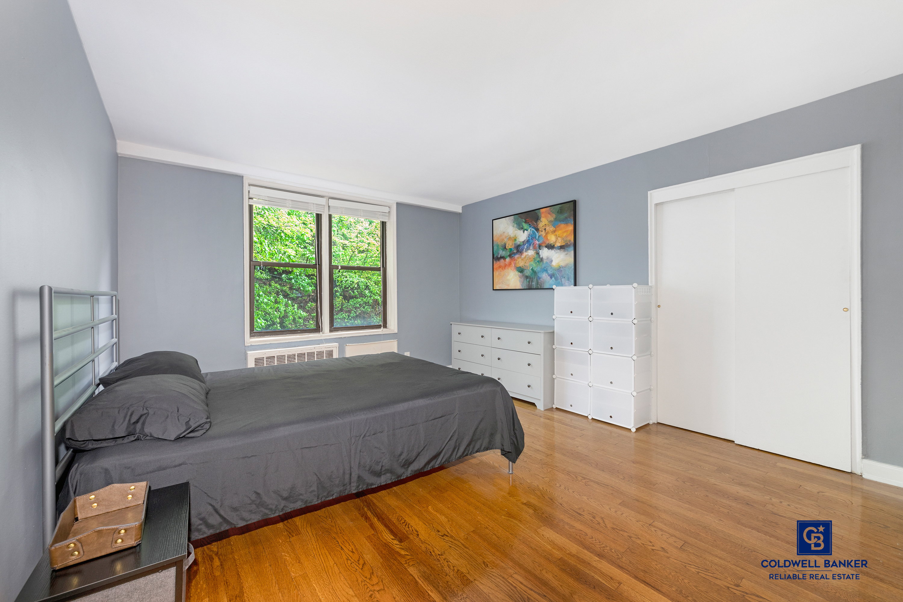 5235 Post Road, Unit 2C Bronx, NY 10471 - Photo 6 of 10 a bedroom with a bed and window