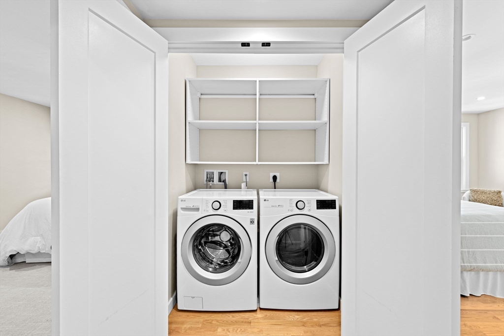 56-58 Perry Street, Unit 4 Brookline, MA 02446 - Photo 14 of 17 a utility room with dryer and washer