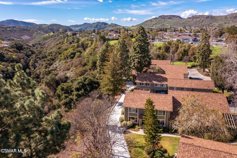 an aerial view of residential house with outdoor space