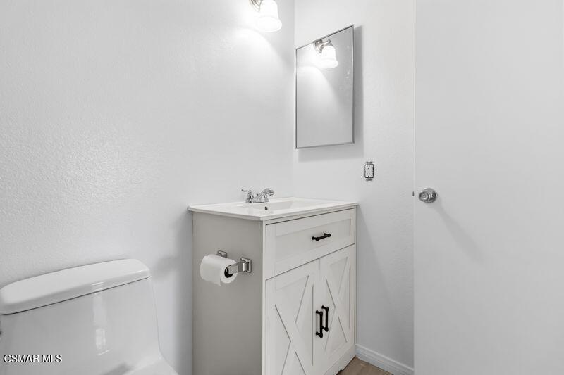 584 Rio Grande Circle Thousand Oaks, CA 91360 - Photo 18 of 19 a bathroom with a shower a sink and toilet