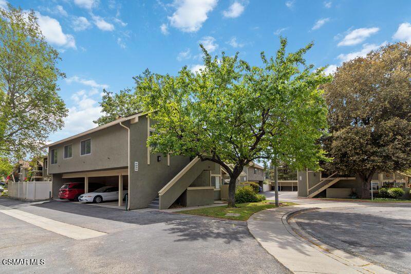 584 Rio Grande Circle Thousand Oaks, CA 91360 - Photo 2 of 19 a view of a house with a yard and tree