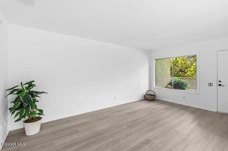 584 Rio Grande Circle Thousand Oaks, CA 91360 - Photo 6 of 19 a view of an empty room with a window
