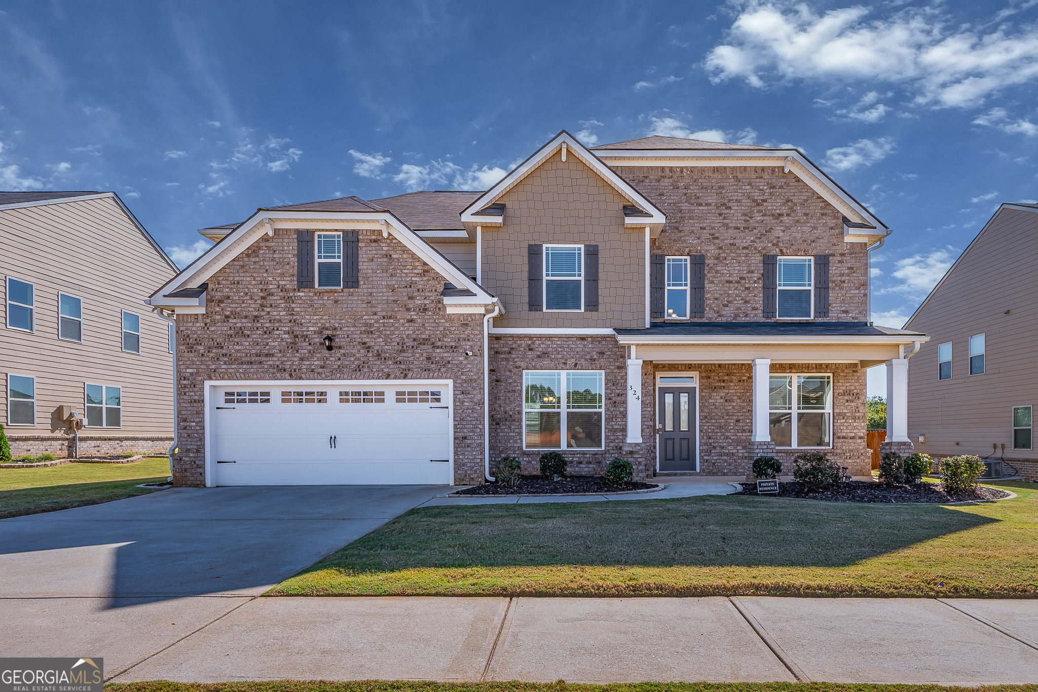324 Conley Avenue Hampton, GA 30228 - Photo 1 of 59 a front view of a house with a yard