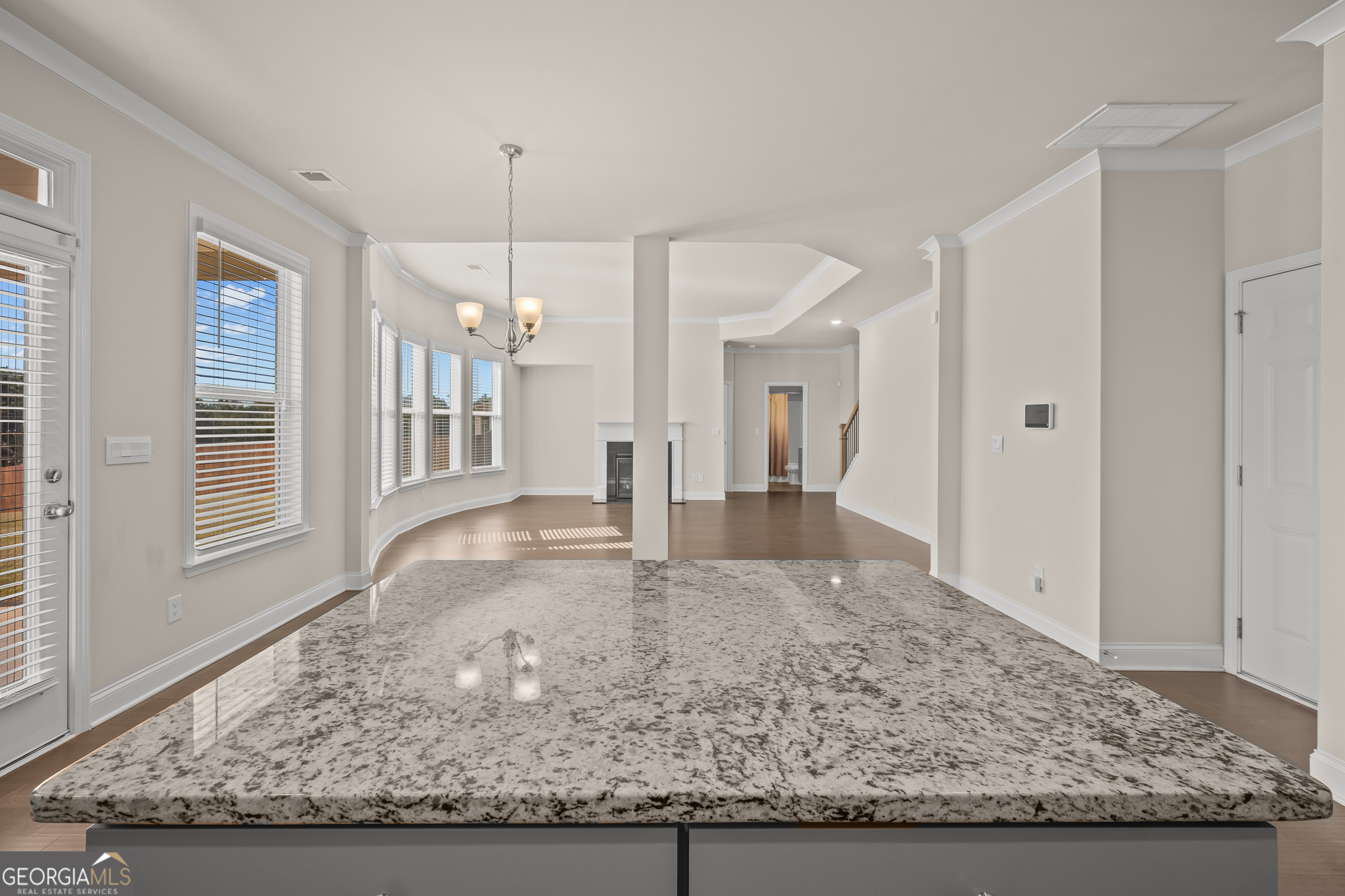 324 Conley Avenue Hampton, GA 30228 - Photo 17 of 59 a view of a kitchen with granite countertop cabinets and wooden floor