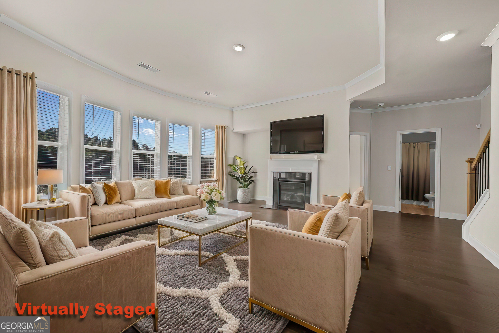 324 Conley Avenue Hampton, GA 30228 - Photo 19 of 59 a living room with furniture a fireplace and a flat screen tv