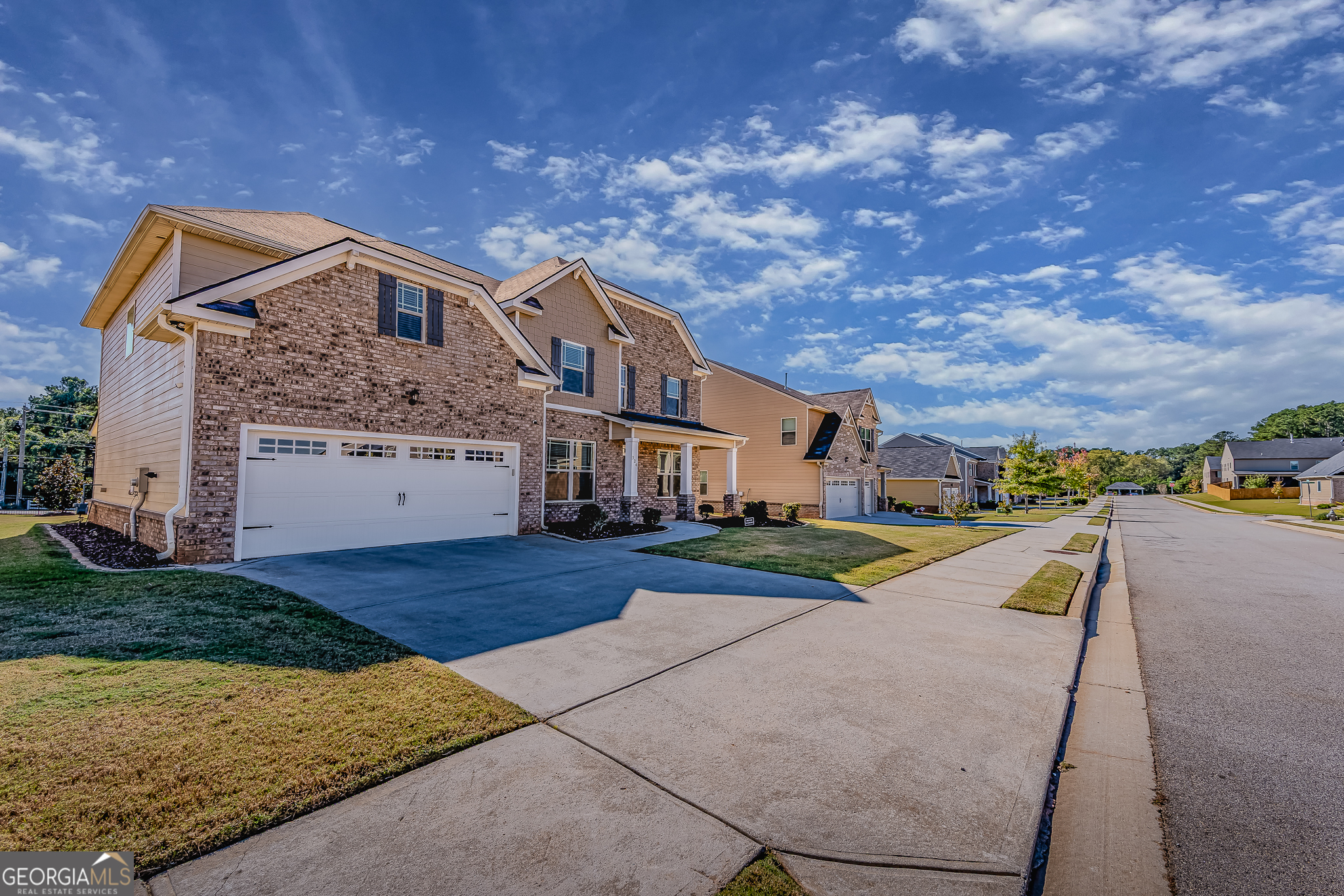 324 Conley Avenue Hampton, GA 30228 - Photo 2 of 59 a front view of house with yard and car parked