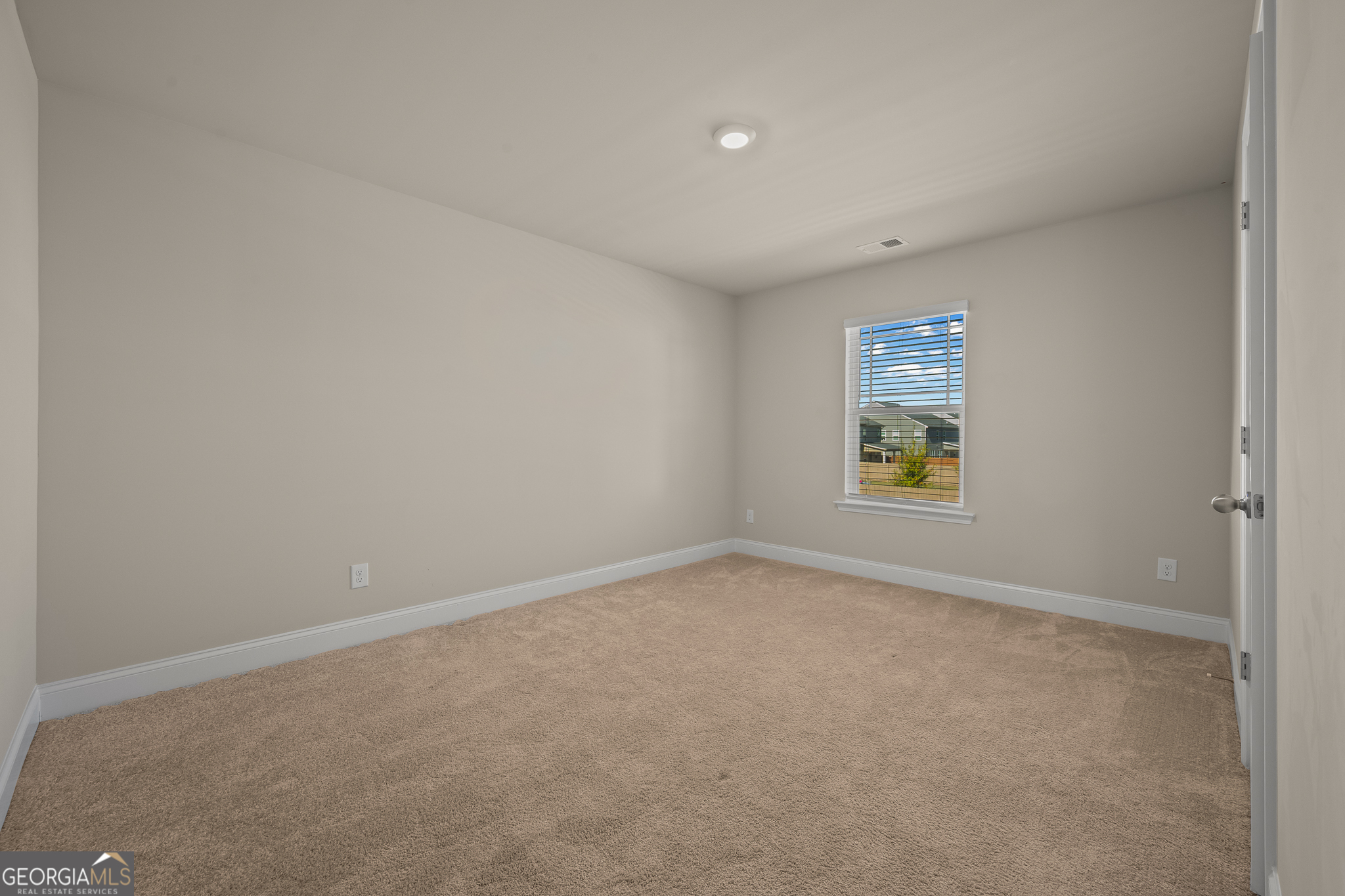 324 Conley Avenue Hampton, GA 30228 - Photo 38 of 59 an empty room with windows