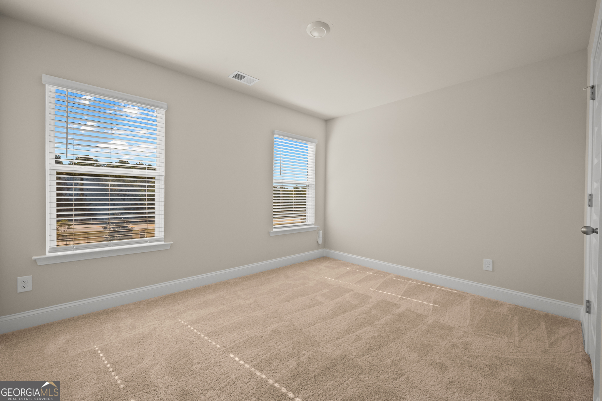 324 Conley Avenue Hampton, GA 30228 - Photo 39 of 59 a view of an empty room with a window