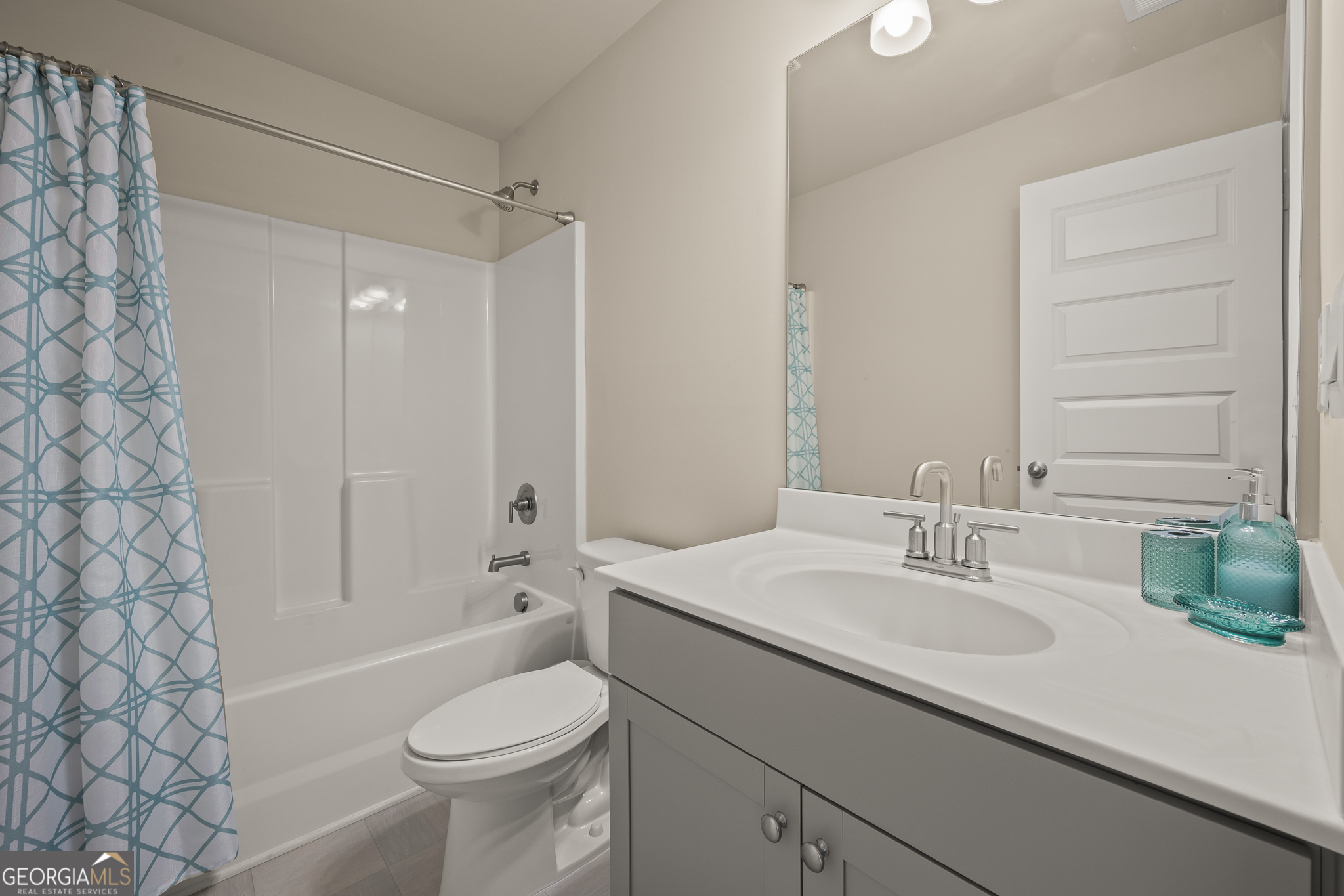 324 Conley Avenue Hampton, GA 30228 - Photo 40 of 59 a bathroom with a sink a toilet and shower