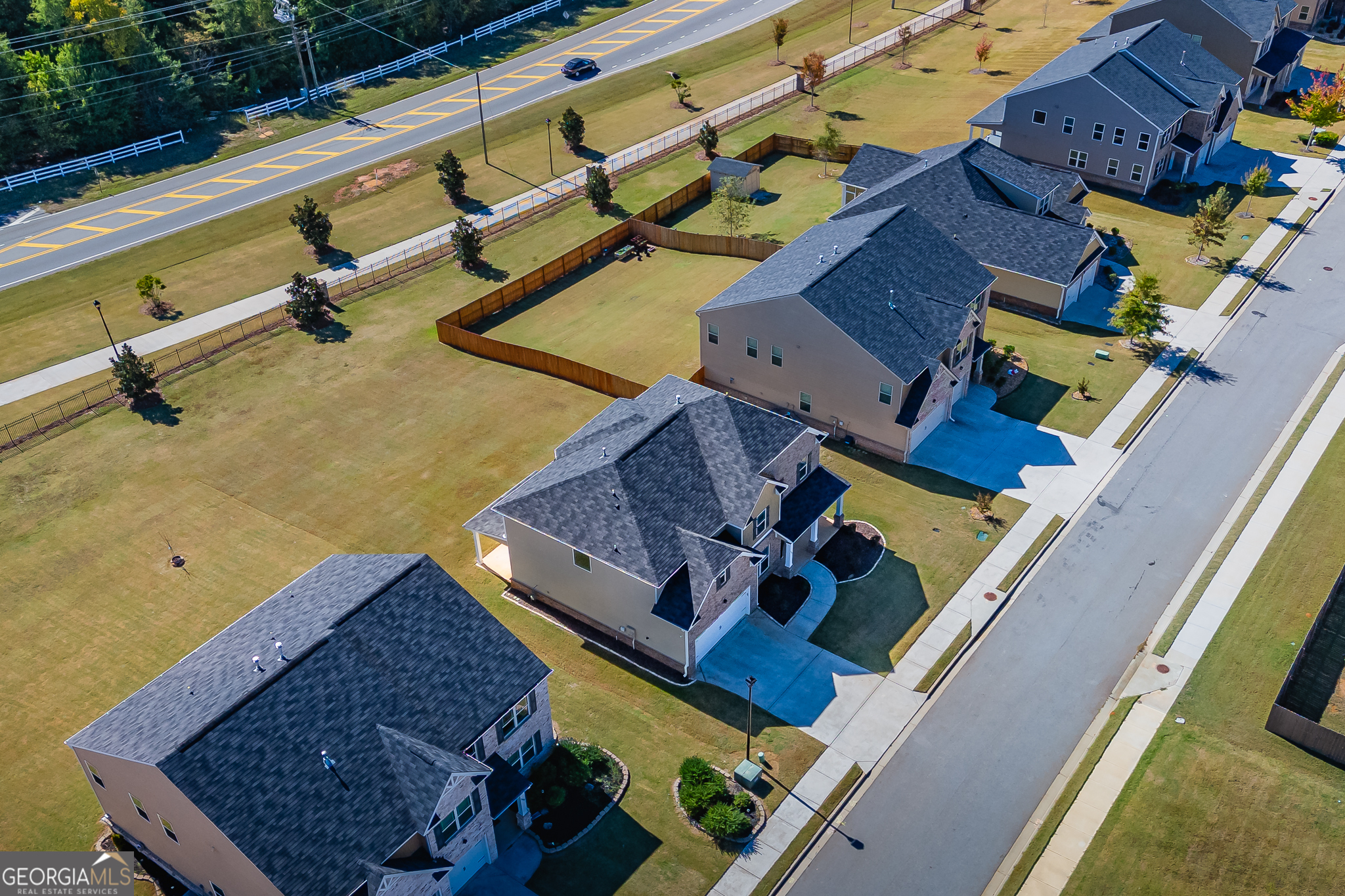324 Conley Avenue Hampton, GA 30228 - Photo 55 of 59 an aerial view of a house with a garden and chairs