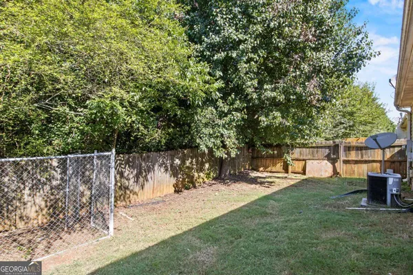 a view of a yard with a slide