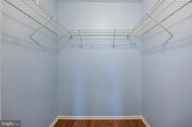 a view of a room with racks on the wall