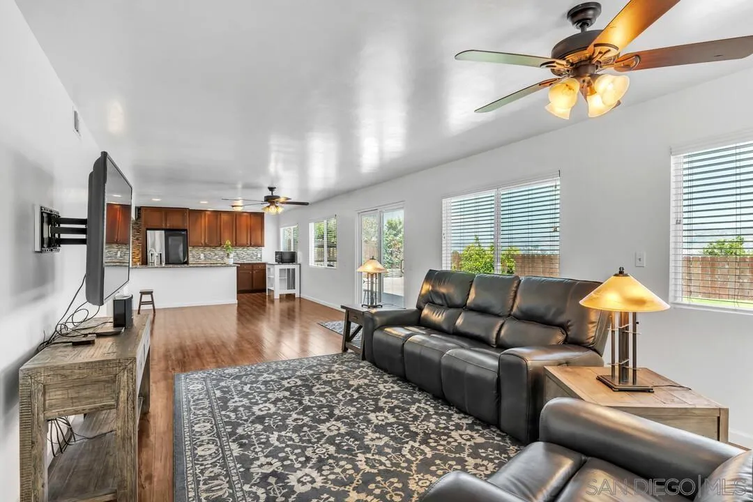 1509 Honey Hill Road El Cajon, CA 92020 - Photo 20 of 49 a living room with furniture and a wooden floor